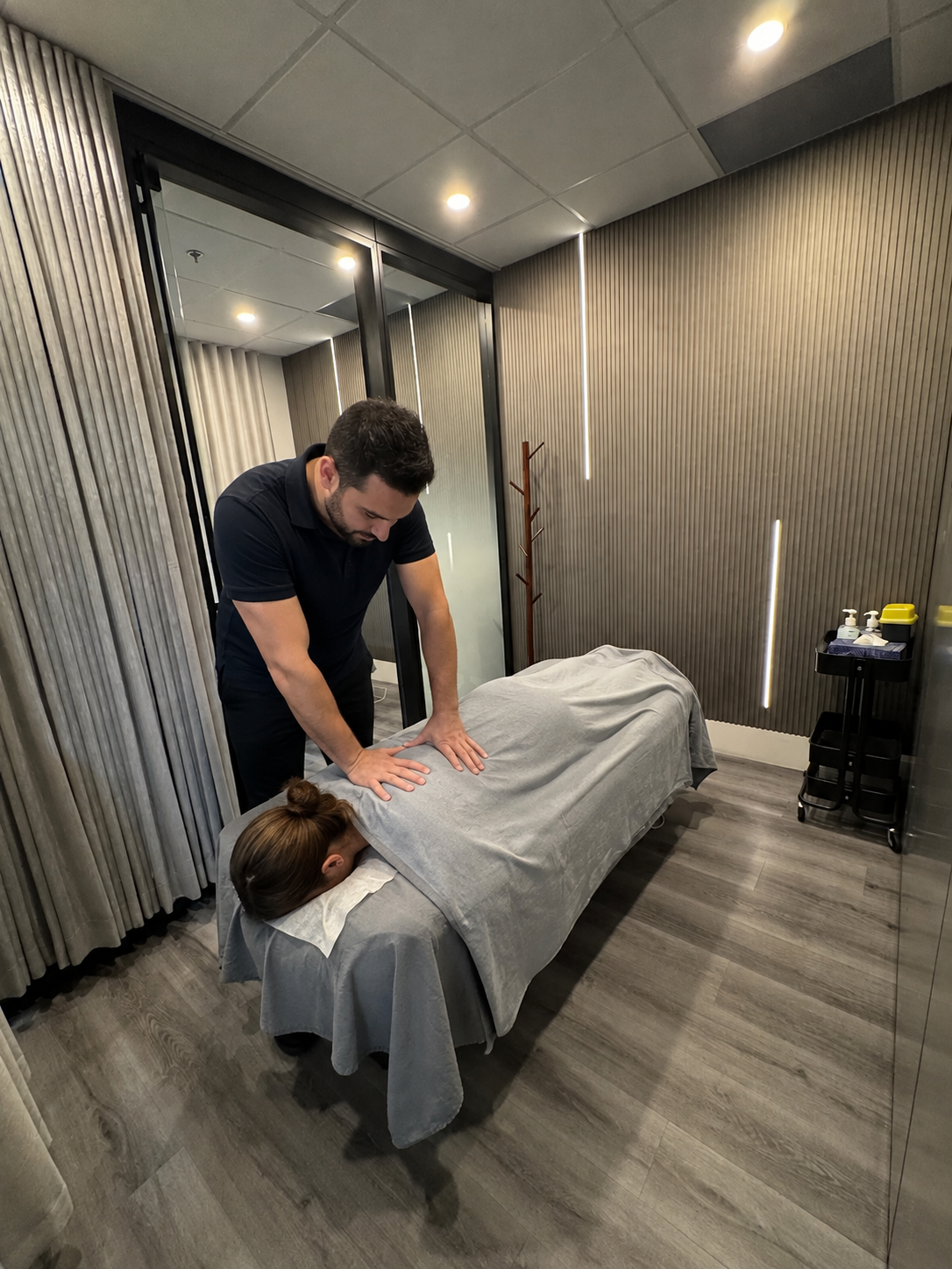 Osteopath providing hands-on treatment to a patient